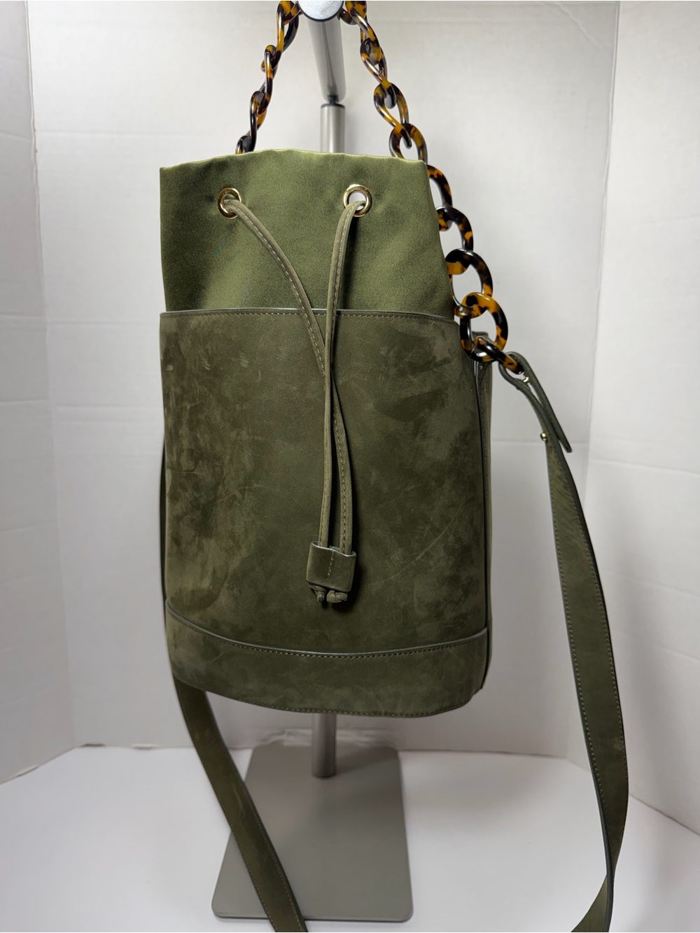 MONTUNAS Olive Green Suede Bucket Bag with Tortoiseshell Chain